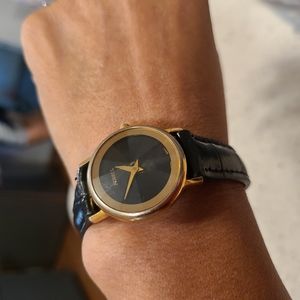 Black Fossil Gold tone watch for a small wrist.